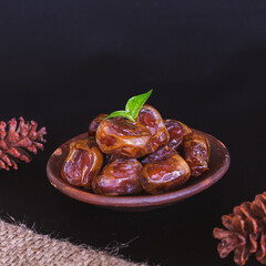 Delicious Date Fruit in a bowl. Bowl of dried dates.