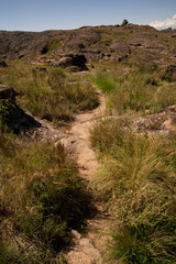 View of the empty hiking path across the hill.