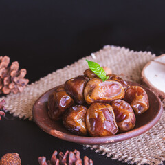 Delicious Date Fruit in a bowl. Bowl of dried dates.