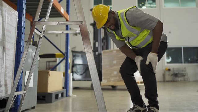 A worker got accident in large warehouse retail store industry. Rack of stock storage. Interior of cargo in ecommerce and logistic concept. Depot. People lifestyle. Shipment service. Safety.