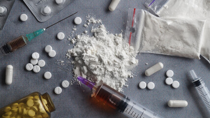 Many different hard drugs on light grey table, flat lay - obrazy, fototapety, plakaty