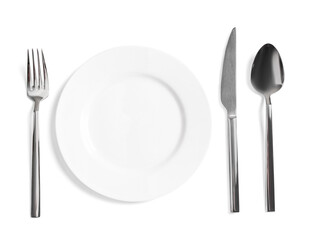 Clean plate and shiny cutlery on white background, top view