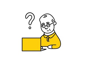 パソコンの前で悩む高齢者