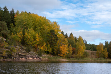 Naklejka premium Lake Ladoga near the village Lumivaara on a sunny autumn day, Ladoga skerries, Republic of Karelia, Russia
