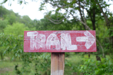 Sign pointing towards hiking trail