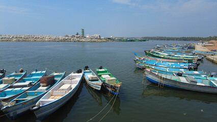 Fototapeta na wymiar Thengapattanam fishing harbour, Kanyakumari district, Tamil Nadu coastline, seascape view