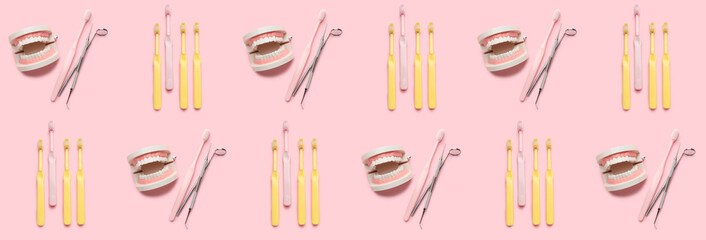 Many models of jaw with dentist's tools and toothbrushes on pink background. Pattern for design