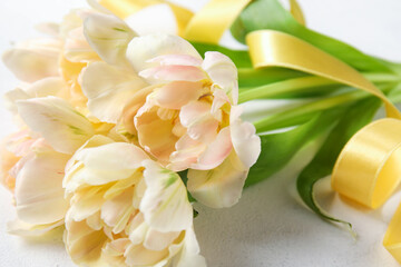 Bouquet of beautiful tulip flowers on light background, closeup