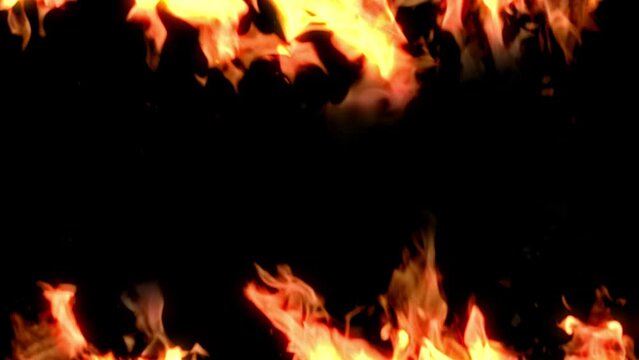 燃える上下の薪の炎のスローモーション背景　火・炎・炎上・SNS炎上のイメージ
