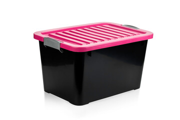 Black plastic storage box and pink lid isolated on white background with clipping path.