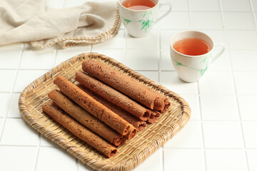 Crispy Egg Roll Biscuit Served with Tea