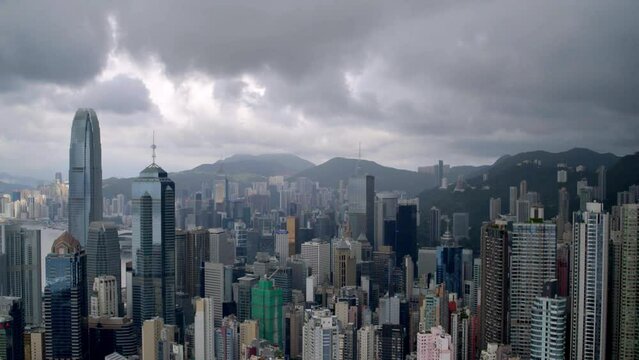 Drone aerial shot of modern skyscrapers in Hong Kong City. Hong Kong is a popular tourist travel destination in Asia. China. Storm clouds. DJI Inspire 2 X7