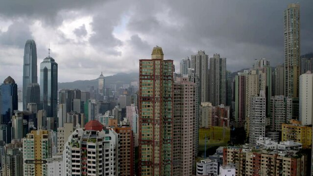 Aerial view of Hong Kong city, financial and business district, China, Asia. Cloudy storm day. 
