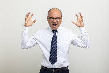 Depressed stressed. Young asian businessman on isolated white background. Angry middle aged Indian businessman in office uniform.