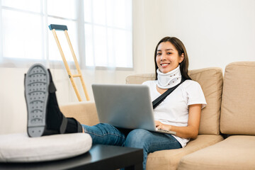 Happy woman recovery from accident fracture broken bone injury with leg splints in cast neck...