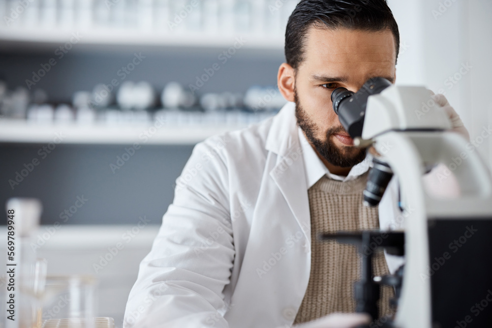 Poster Science, microscope and analytics with a doctor man at work in a laboratory for innovation or development. Medical, research and biotechnology with a male scientist working in a lab for breakthrough