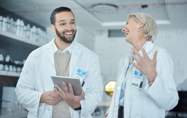 Science, tablet and scientists talking in a lab working on scientific research, experiment or test. Happy, funny and professional researchers laughing in discussion with mobile device in a laboratory