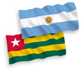 Flags of Togolese Republic and Argentina on a white background