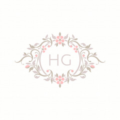 Floral frame monogram with pink flowers. Classic decorative element.