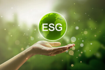 asian man hand with ESG icon global sustainability concept. Environment, society and governance...