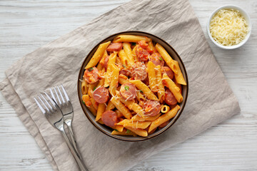 Homemade One-pot Hot Dog Pasta in a Bowl, top view. Flat lay, overhead, from above.