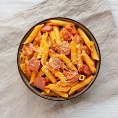 Homemade One-pot Hot Dog Pasta in a Bowl, top view. Flat lay, overhead, from above.