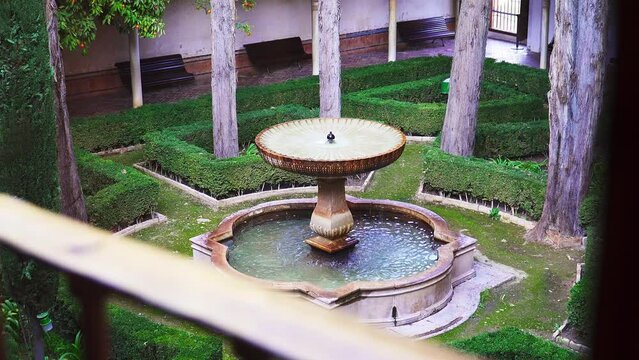Fixed Shot From Balcony Of Old Fountain In Green Garden, Al Hambra de Granada, Spain