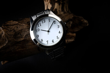 classic wrist watch on a wooden background
