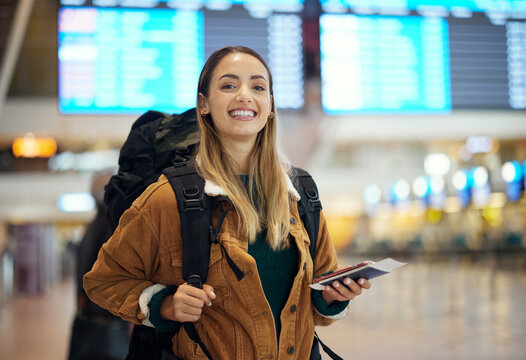Airport, travel and portrait of woman with passport, flight ticket or information of immigration, journey and backpack. Young person, identity document and international registration. faq or about us