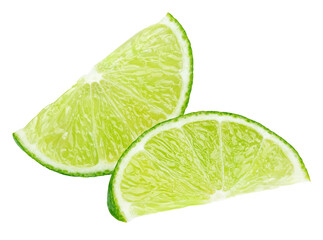 Two ripe slices of green lime citrus fruit isolated on transparent background
