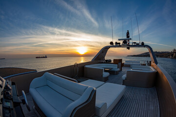 sunset from the deck of luxury motor yacht
