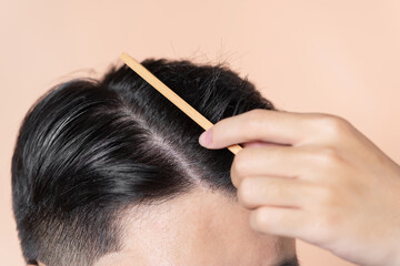 Close up photo of clean healthy man's hair.