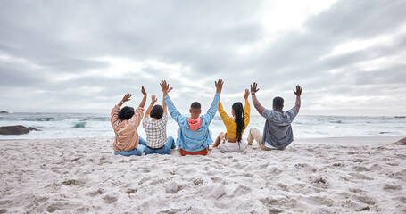Diversity, hands up or friends on beach sand to relax on holiday, vacation bonding in nature...