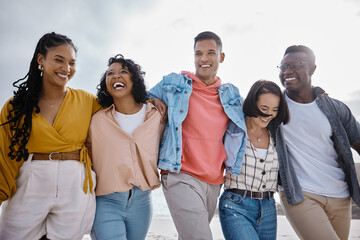 Happy, friends and walking at the beach for holiday, diversity and vacation while bonding on sky background. Men, smile and women group relax at the sea, laugh and cheerful on an ocean trip in Miami