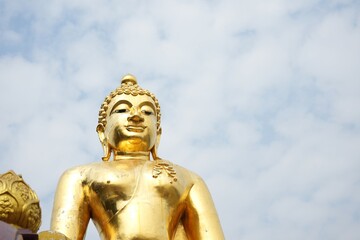 Fototapeta na wymiar buddha statue stucco in buddhism big gold