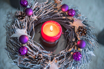 Decorative advent wreath with burning candle, Bavaria, Germany