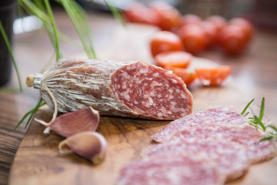 Close up of red sausage with garlic cloves, Germany