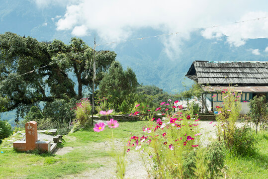 Traditional house in Nepal with Himalayas mountain in background