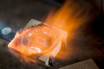 Melting copper in a jewelry shop, Bavaria, Germany