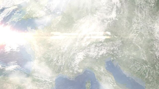 Earth zoom in from outer space to city. Zooming on Saint Louis, France. The animation continues by zoom out through clouds and atmosphere into space. Images from NASA