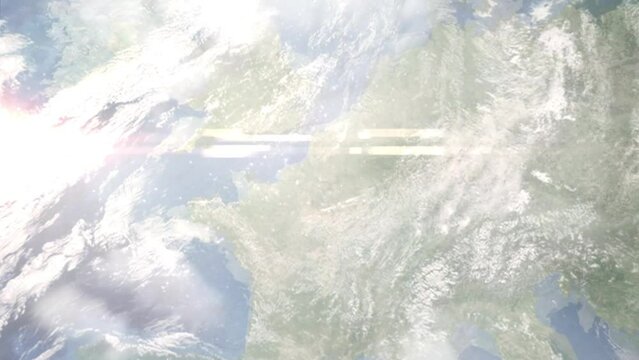 Earth zoom in from outer space to city. Zooming on Fleurus, Belgium. The animation continues by zoom out through clouds and atmosphere into space. Images from NASA