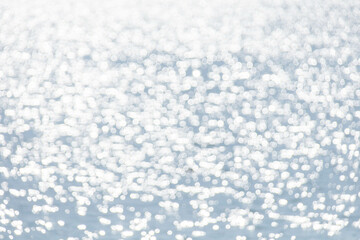 Abstract sea background, Sky and sea water bokeh, Defocused blue water surface with shiny bokeh lights.