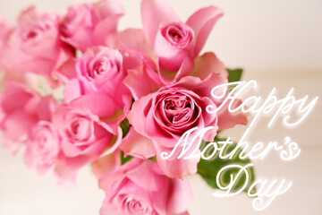 Happy mother's day pink rose background with texts. Pink floral background with Happy mother's day lettering for greeting, message card, banner and design. 