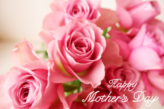 Happy mother's day pink rose background with texts. Pink floral background with Happy mother's day lettering for greeting, message card, banner and design. 