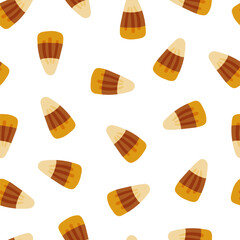 Candy corn vector seamless pattern. Halloween sweets texture.