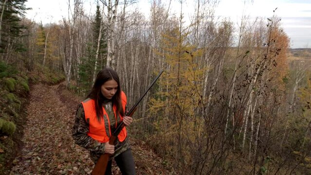 Female Hunter on Enchanted Forest Trail