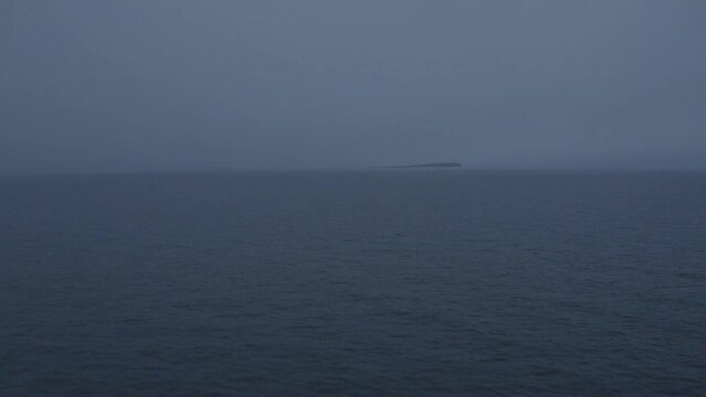 A drone fotage of the islands in the fog