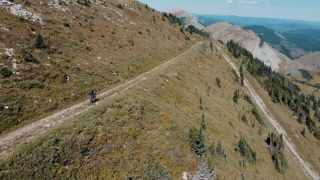 Mountain Bike Descending Mountain In Alberta