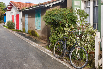 Arcachon bay. L´Herbe picturesque oyster village. Colorful houses. Aquitaine, France