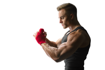Strong man wrap hands on black background Man is wrapping hands with red boxing wraps isolated on black background Strong hands and fist, ready for training and active exercise